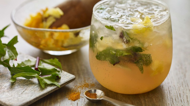 Pineapple Turmeric Mocktail with Muddled Dandelion Greens